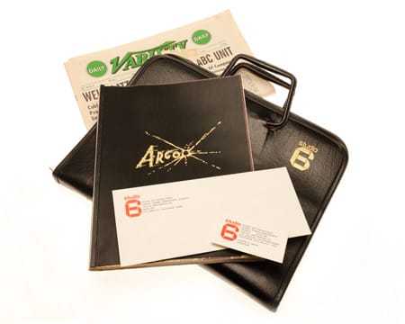 An envelope, business card, and briefcase with the Studio 6 Logo, along with a booklet about Argo and a copy of Variety