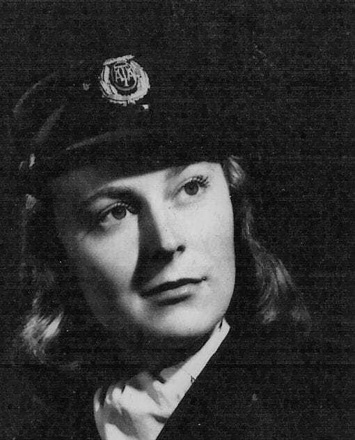 A headshot of Betty Ann Lussier in her pilot hat.